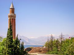 Yivli Minaret with Taurus Mountains in Antalya, Turkey