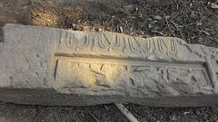 Granite stone carving depicting a lion, symbol of the Chutia kingdom