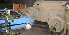 Army bomb disposal display at Imperial War Museum Duxford with historical equipment and vehicles