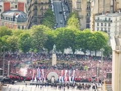 PSG fans celebrating with flags and banners