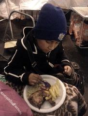 Smiling boy wearing winter clothing outdoors