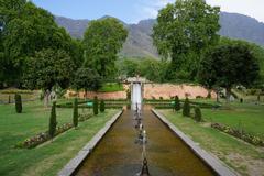 Nishat Bagh, a terraced Mughal garden with chinar and cypress trees, located on the eastern side of the Dal Lake in Srinagar, Jammu and Kashmir.