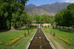 Nishat Bagh terraced Mughal garden with central canal, chinar and cypress trees, in Srinagar, Jammu and Kashmir, India