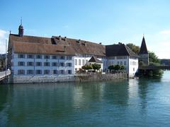 Right bank of the Aare River in Solothurn, Switzerland with old hospital, hospital church, and Krummturm