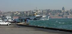 Golden Horn waterway with boats and buildings at sunset in Istanbul