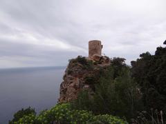 Banyalbufar village in Balearic Islands, Spain with terraced hillside and blue sea