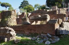 Ancient ruins at the Roman Forum with the House of the Vestals viewed from Via Sacra in Rome