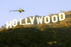 HeliGraphix World Scenic Flights flying over the Hollywood Sign in California