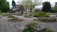 Alpine Garden at Royal Botanic Garden of Edinburgh with glasshouses in the background