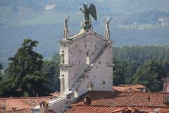 historic buildings and stone tower in Lucca