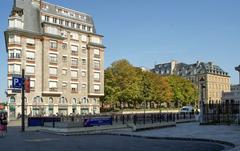 Building at the entrance of Place Dauphine in Paris