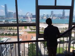 HK Central City Hall interior stairs glass window view of Promenade Waterfront and Victoria Harbour