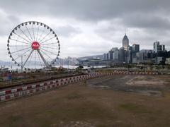 Central Waterfront Promenade in Hong Kong with big eye Ferris wheel