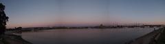 Panoramic view of the inner harbor of Port Adelaide at dusk with tall ships and locally-based vessels