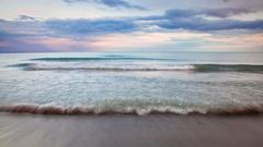 Woodbine Beach shoreline with greenish water