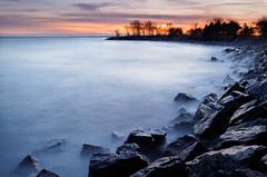 Smooth and silky water over boulders at Woodbine Beach