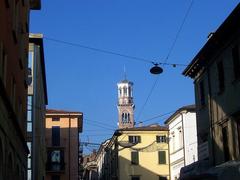 Lamberti Tower in Verona under a blue sky