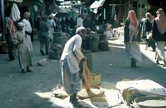 Market in Tayif with people shopping, 1970s Saudi Arabia