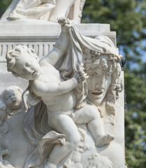 Mozart monument figures and details in Burggarten, Vienna