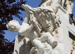 Mozart monument in Vienna's Burggarten with detailed sculptures