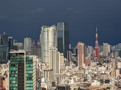 Roppongi Hills and Tokyo Tower with dark stormy background