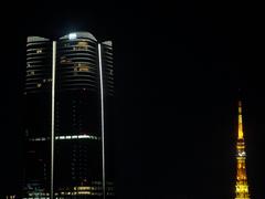 Azabudai Hills with only 33rd floor lit up at night