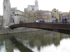 Panoramic view of River Onyar and Pont de Sant Feliu with Església de Sant Feliu and Girona Cathedral in the background