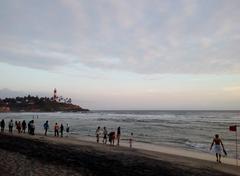 Kovalam Light House Beach in the evening with a lighthouse in view