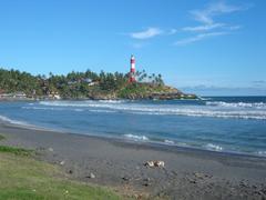 Kovalam lighthouse on Lighthouse Beach at sunset