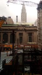 construction work at the foundation of One Vanderbilt with Grand Central Terminal and Chrysler Building in the background