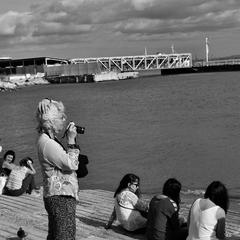 A Photographer Lady in Cais das Colunas, Lisbon