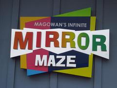 Sign for Magowan's Infinite Mirror Maze at Pier 39 in San Francisco