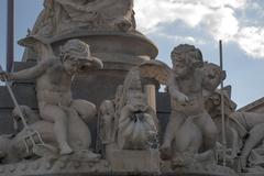 Cupids riding dolphins, part of the Pallas Athene fountain in front of the Austrian Parliament Building in Vienna