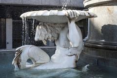 Statues at the Parliament building fountain in Vienna