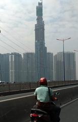 Saigon's Landmark 81 tower under construction, view from Saigon Bridge