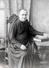 Modesto Churruca with a desk and books