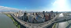 Aerial panorama of Taipei's west from Tamsui River