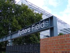 Potters Fields sign with missing 's' painted in blue