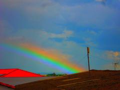 colorful rainbow over landscape