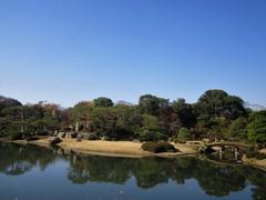 Rikugi-en Garden in winter with a pond and traditional Japanese structures