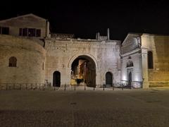 Arco d'Augusto in Fano, Italy at night