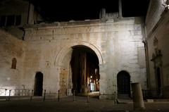 Arco d'Augusto illuminated at night