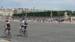 Cyclists at Place de la Concorde in Paris