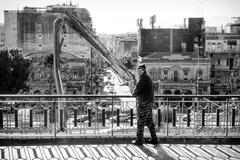 black and white street photography of a building site