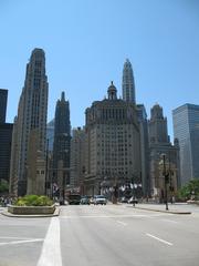 Michigan Avenue Bridge traffic with notable buildings in the background