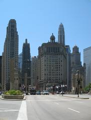 Traffic on Michigan Avenue Bridge with iconic Chicago buildings in the background