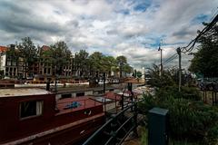 Panoramic view of Oudeschans canal and Montelbaanstoren tower in Amsterdam