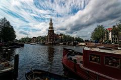 Panoramic view of Oudeschans canal and Montelbaanstoren in Amsterdam