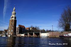 Amsterdam canal with traditional buildings and boats