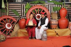 modern Samvedi Christian couple dressed in traditional attire for a wedding procession